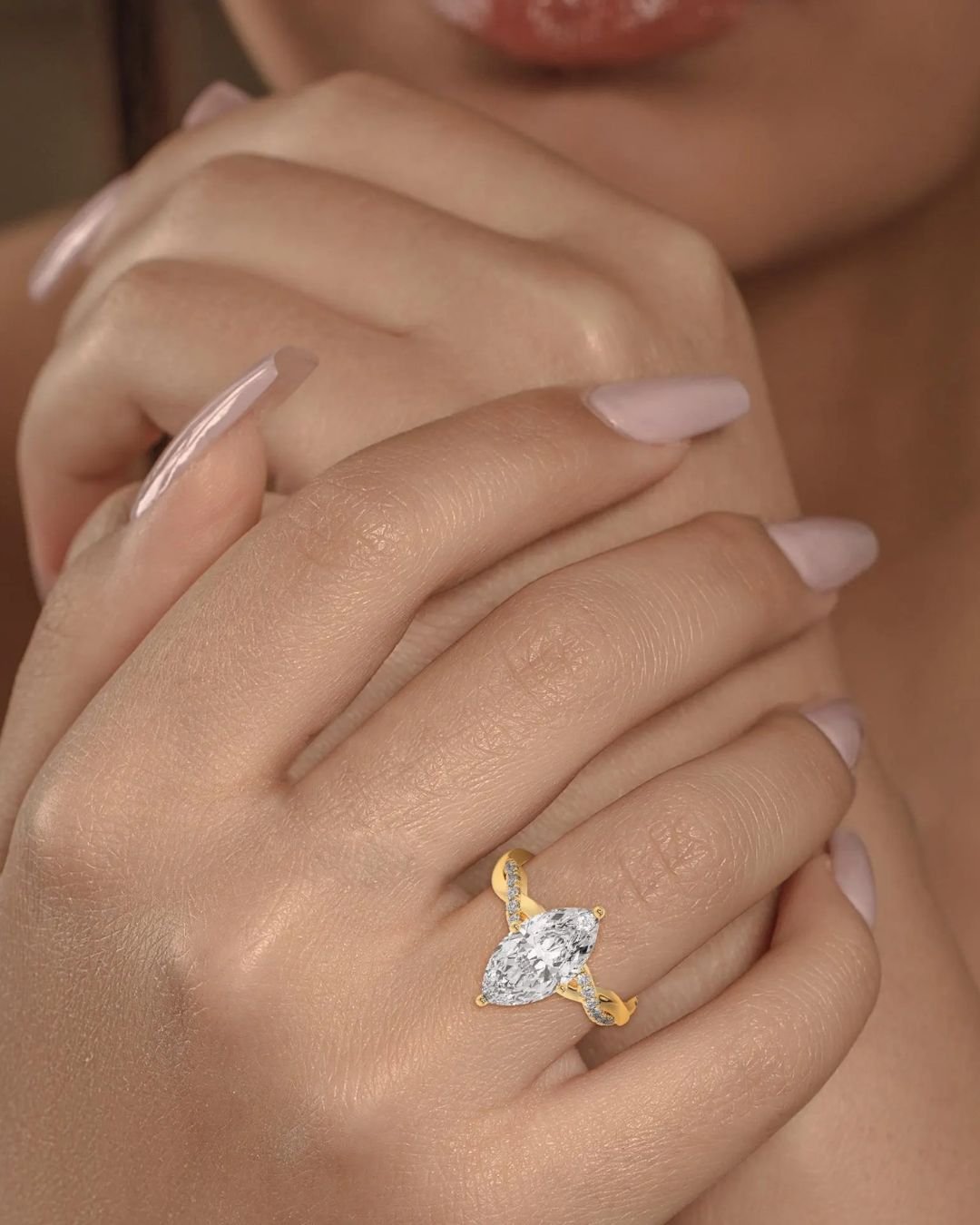 Marquise Diamond Engagement Ring With Twisted Band