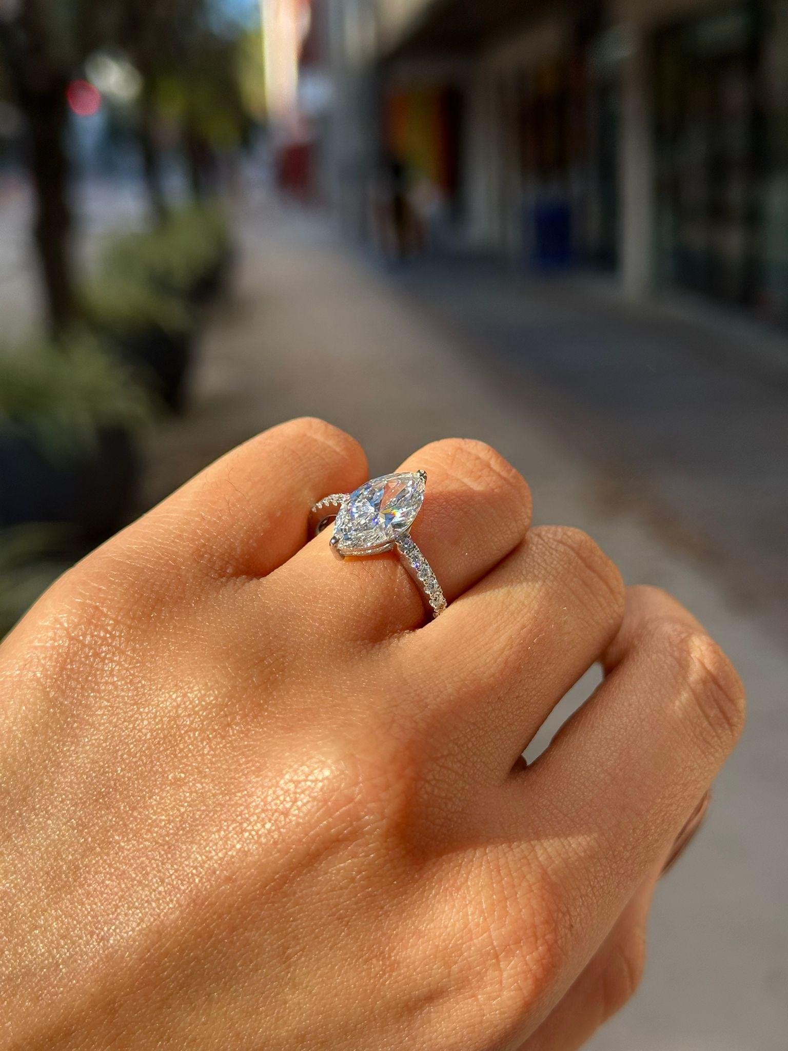 Marquise Cut Diamond Engagement Ring with Pave Band