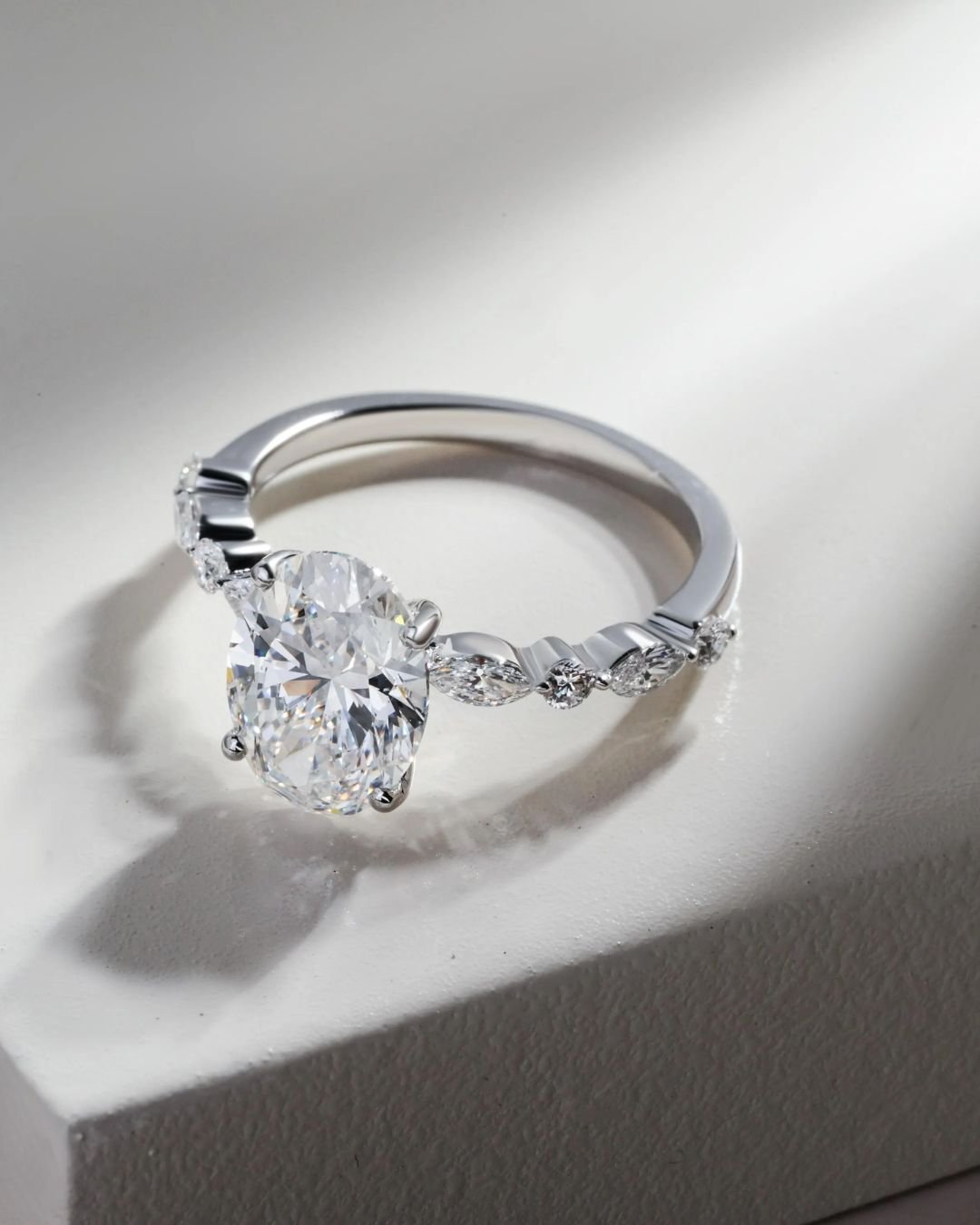 Oval Solitaire Engagement Ring With Side Stones