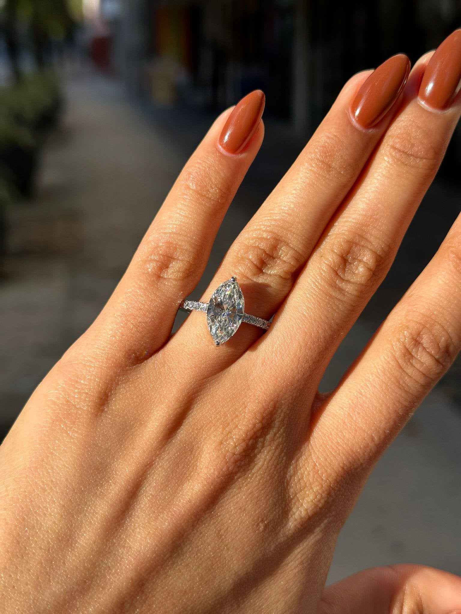 Marquise Cut Diamond Engagement Ring with Pave Band