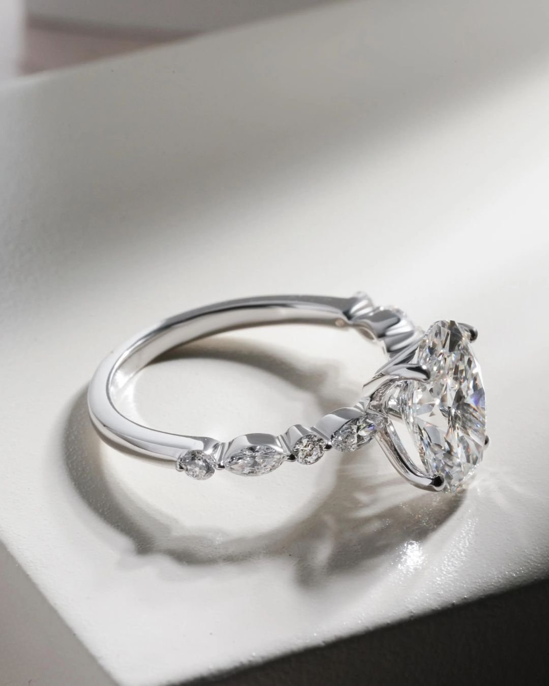 Oval Solitaire Engagement Ring With Side Stones