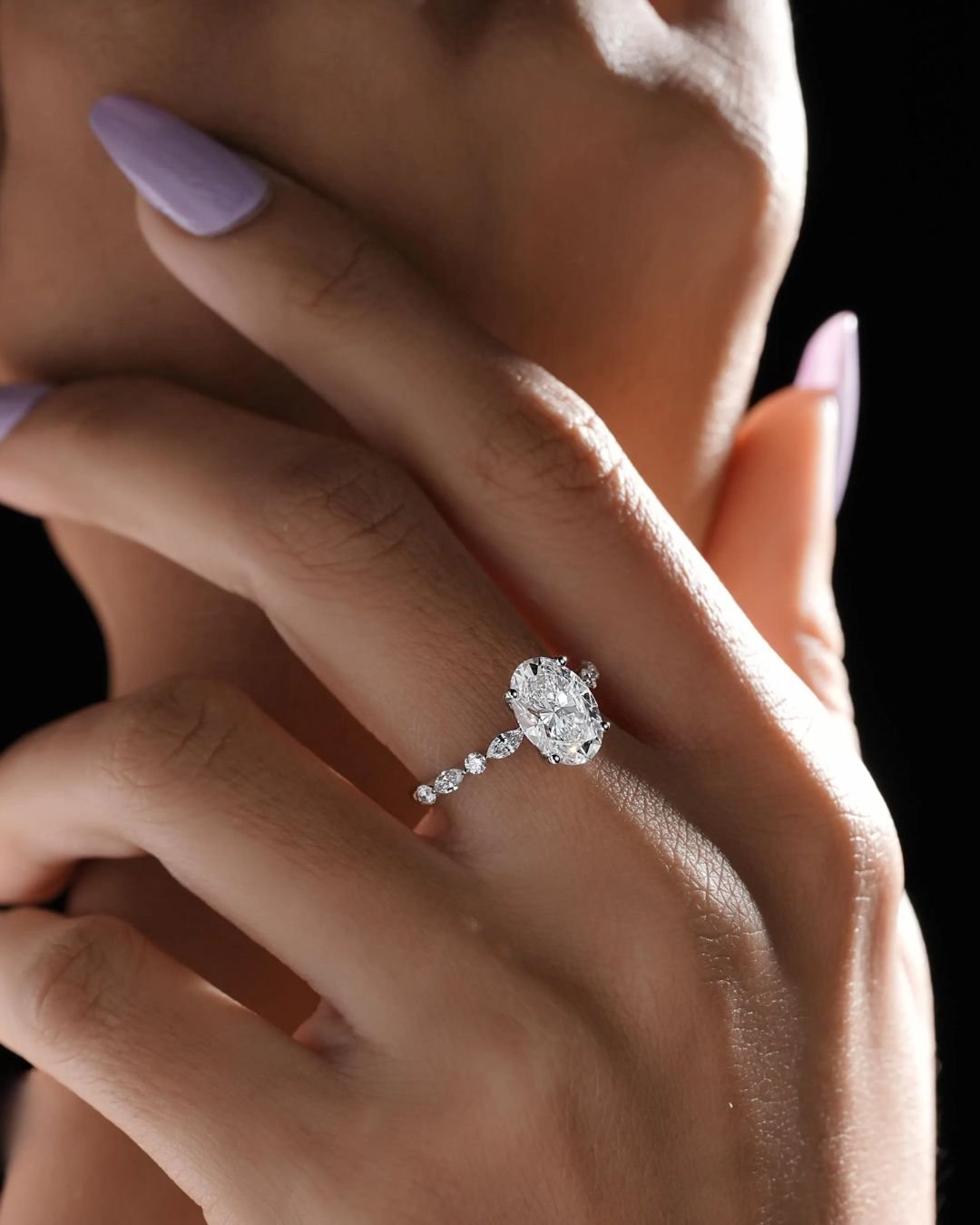Oval Solitaire Engagement Ring With Side Stones