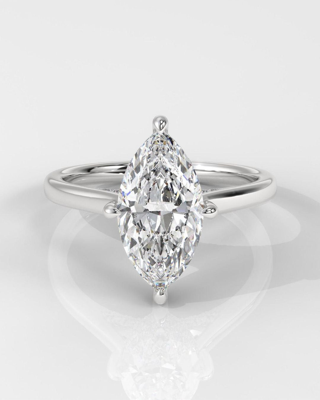 Marquise Cut Engagement Ring With Hidden Halo