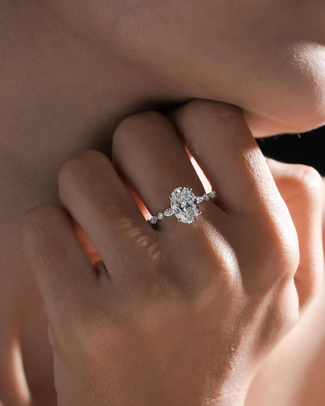 Oval Solitaire Engagement Ring With Side Stones